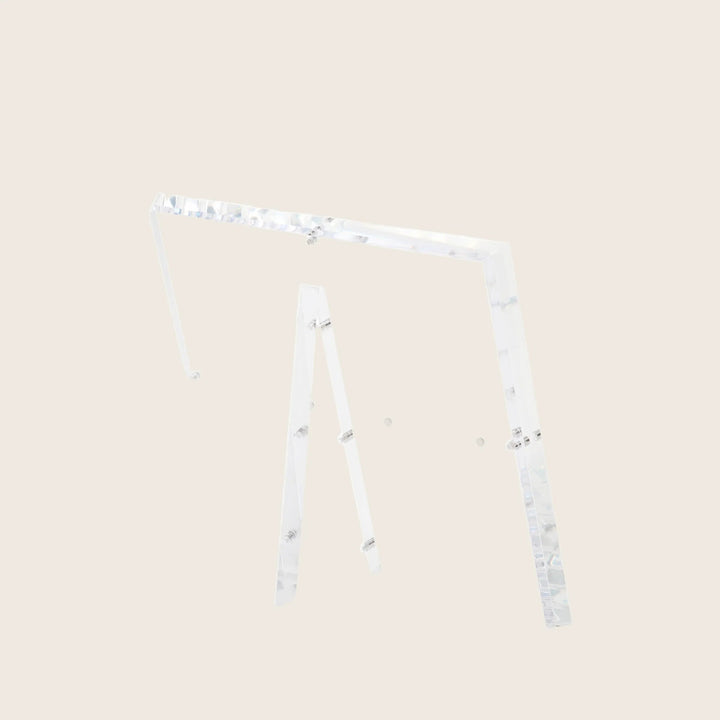 Minimalistic and elegant acrylic easel showcases items with modern design.