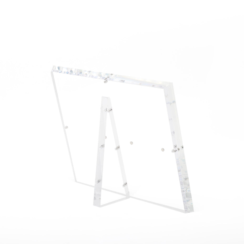 Minimalistic and elegant acrylic easel showcases items with modern design.