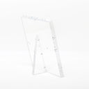 Minimalistic acrylic easel with raised edge for secure display.