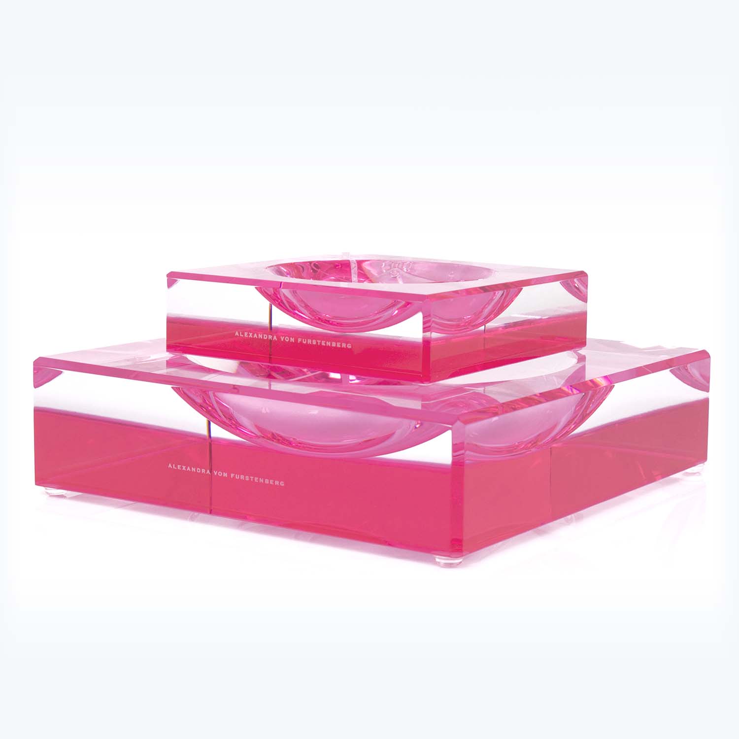 Translucent pink acrylic centerpiece with concave impressions by Alexandra Von Furstenberg