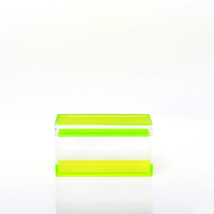 Minimalist acrylic box with neon green border on glossy surface
