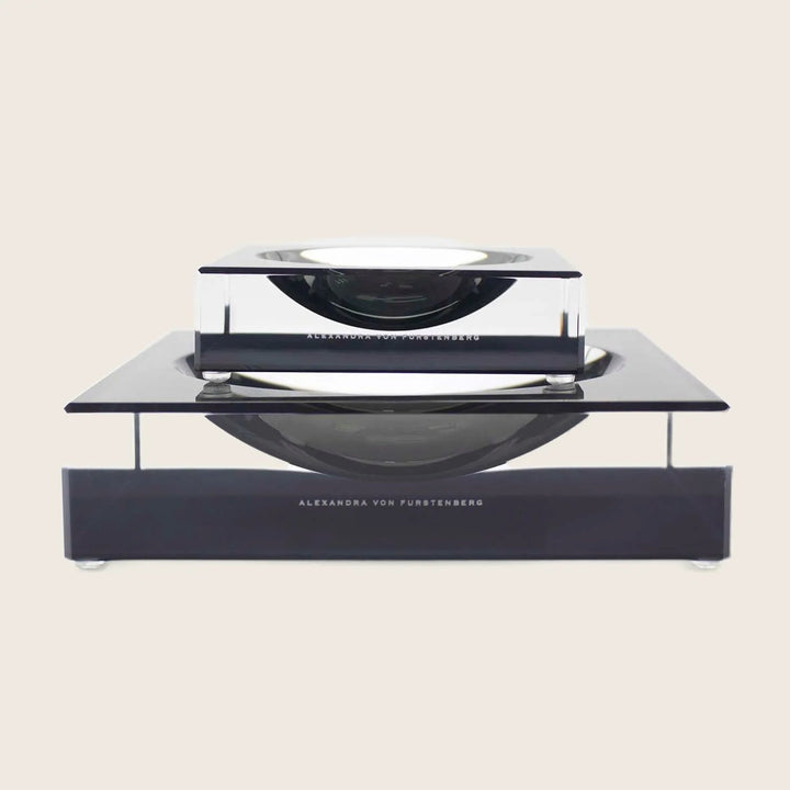 Modern and elegant ALEXANDRA VON FURSTENBERG ashtray on sleek stand.