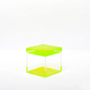 Minimalist fluorescent lime-green side table with clean lines and symmetry.