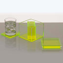 Minimalistic, modern laboratory setup with neon yellow acrylic test tube rack and lid.