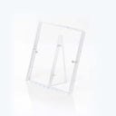 Transparent acrylic display stand with folding back support on white background.