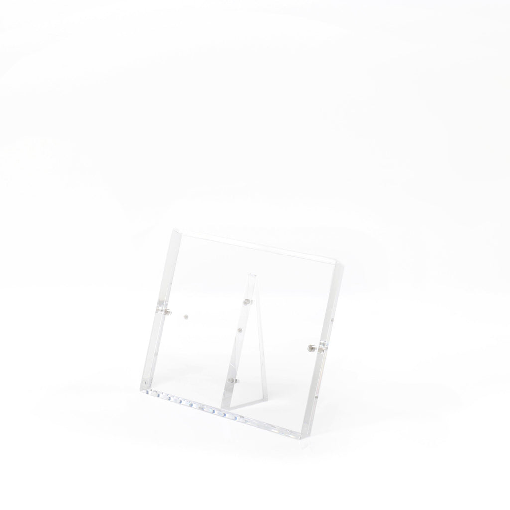 Sleek and versatile acrylic stand for elegant item display.