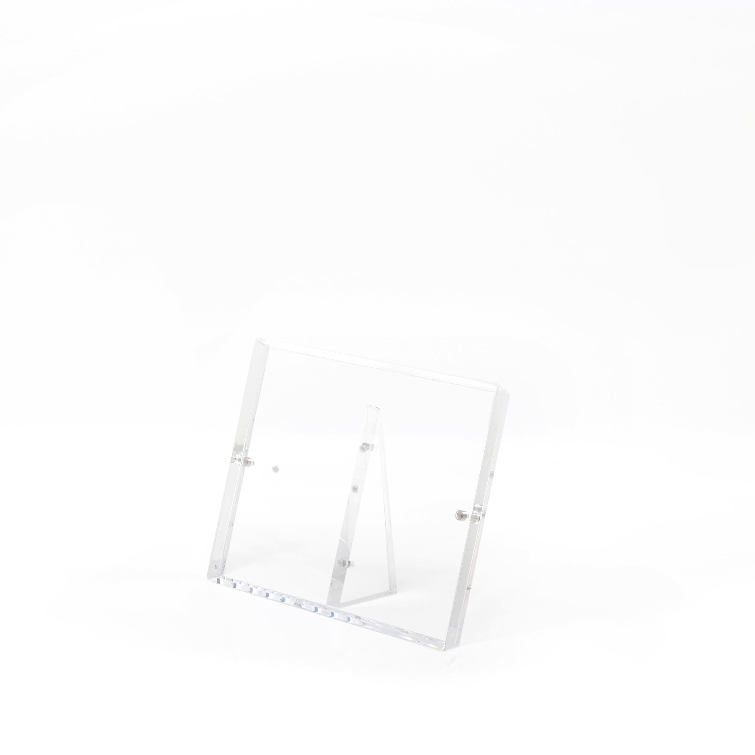 Sleek and versatile acrylic stand for elegant item display.