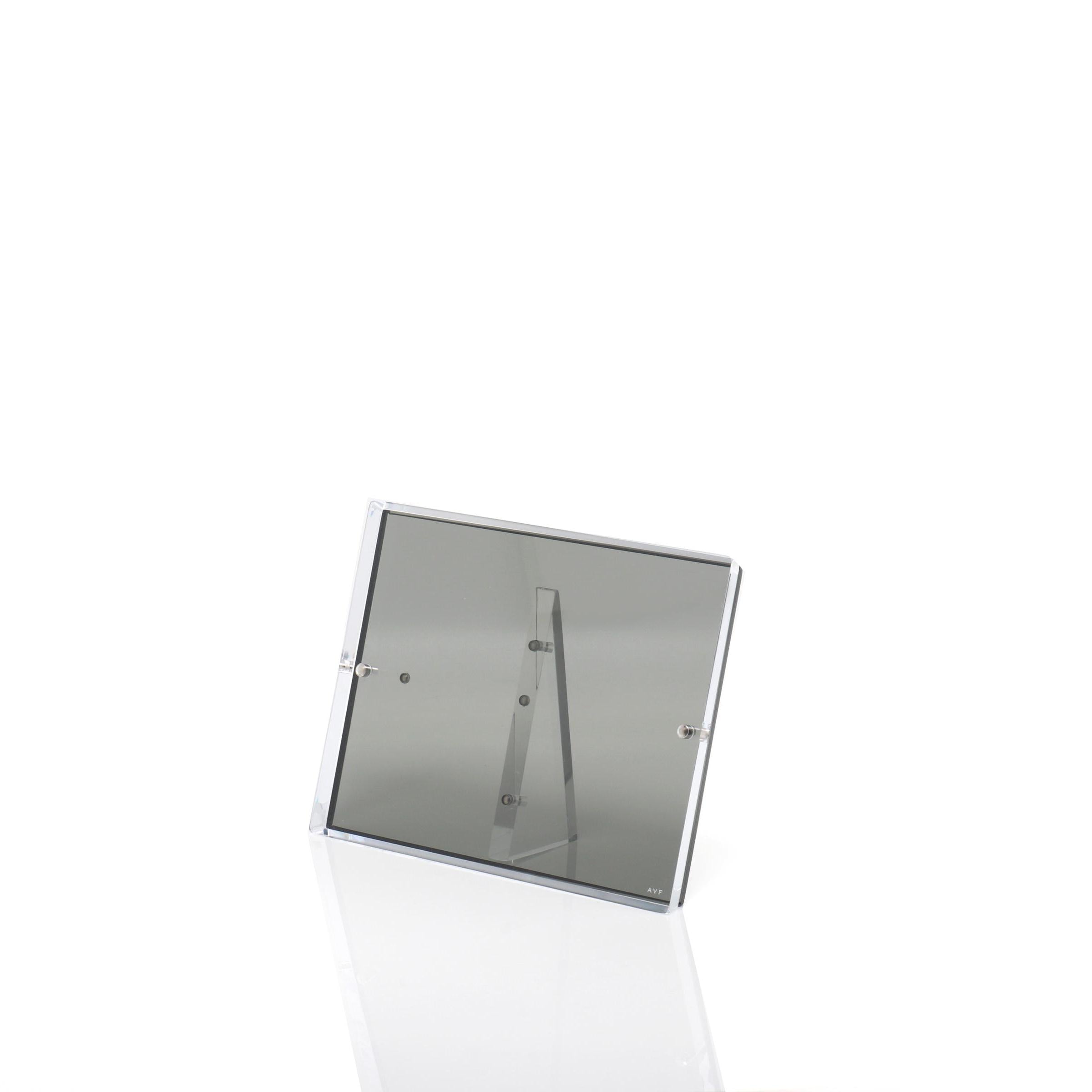 Elegant, transparent plaque with beveled edges mounted on a stand.