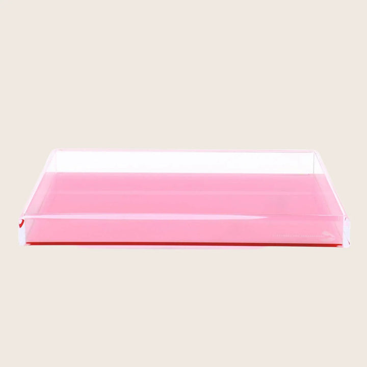 Transparent, pink-tinted tray with raised edges, versatile for various uses.