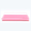 Transparent, pink-tinted tray with raised edges, versatile for various uses.