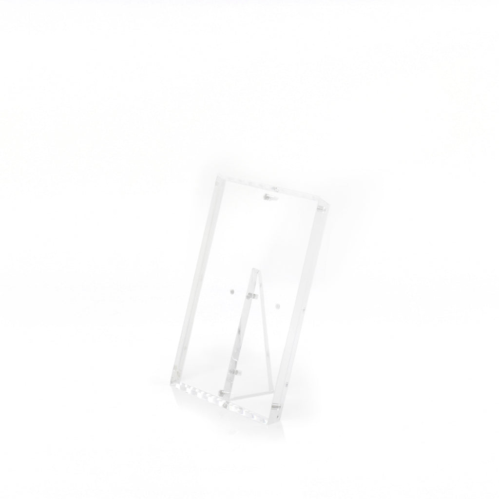 Clear acrylic stand with slanted back leg for optimal visibility.