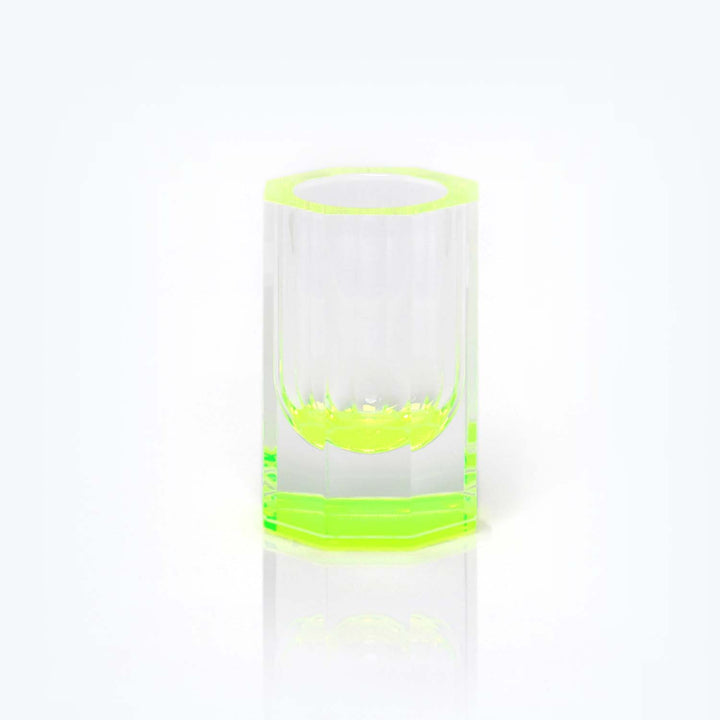 A modern and playful clear glass with vibrant neon green accents.