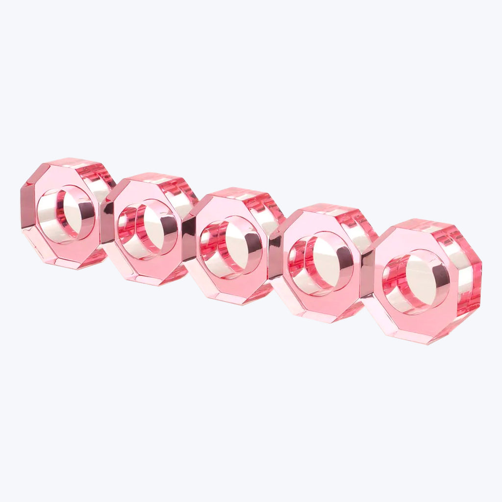 Row of pink-toned octagonal transparent shapes with central holes.