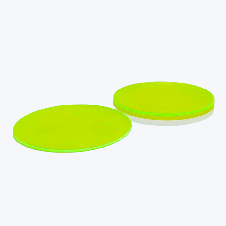 Vibrant green circular discs for versatile use and high visibility.