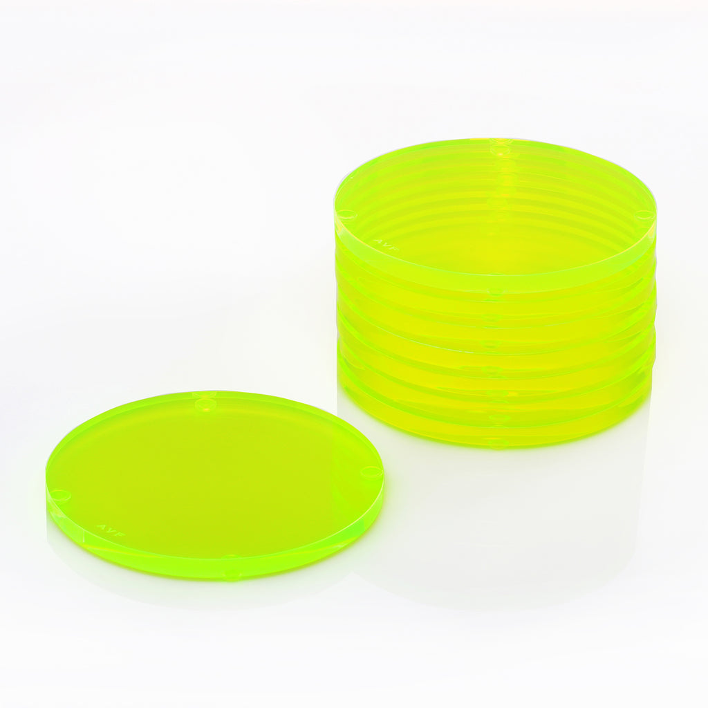 Neon green plastic petri dishes stacked, with matching cover.