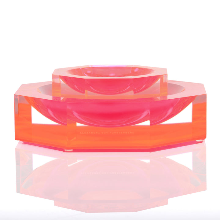 Futuristic decorative object showcases vibrant hues and geometric shapes.