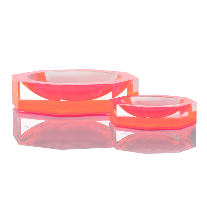 Vibrant acrylic decorative bowls cast soft reflections, creating ethereal aesthetic.