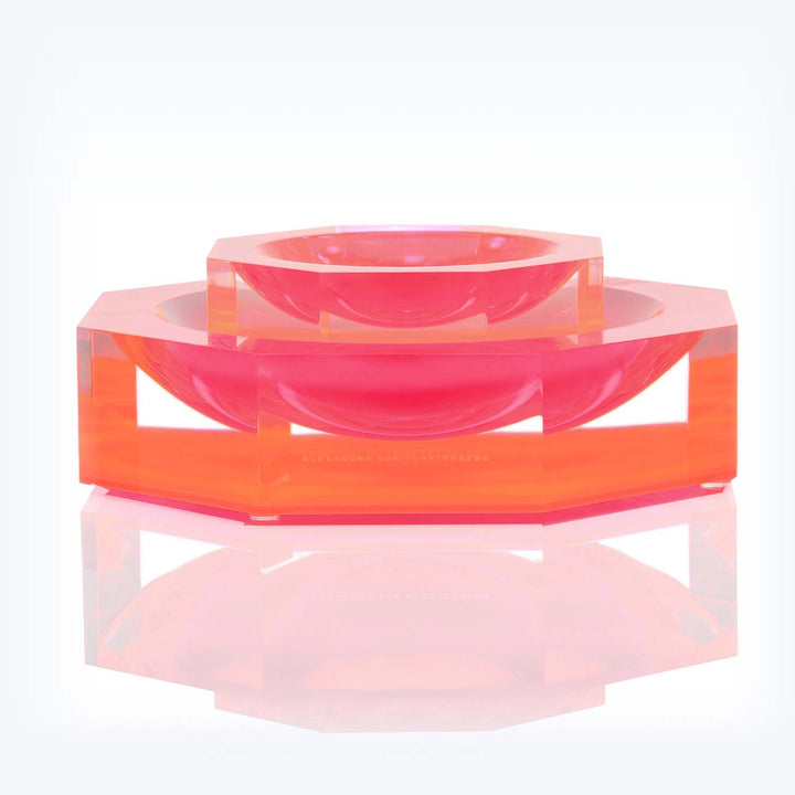 Vibrant, geometric acrylic decorative item creates an eye-catching centerpiece.
