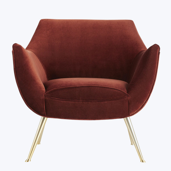 Chic and sophisticated armchair with plush velvet upholstery and metallic legs.