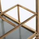 Close-up of a gold metallic frame in angular design.