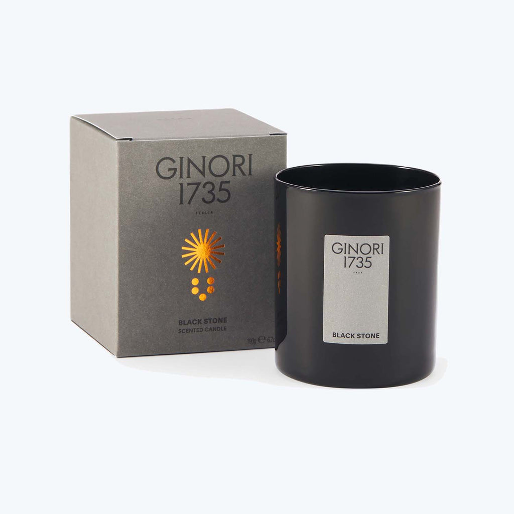 GINORI 1735's luxurious scented candle in sleek packaging and design.