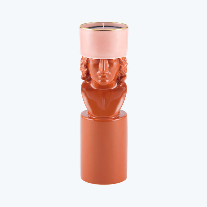 Monochromatic terracotta sculptural candle features classical-inspired human bust design
