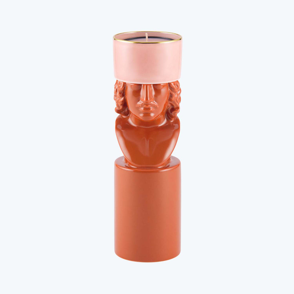 Monochromatic terracotta sculptural candle features classical-inspired human bust design