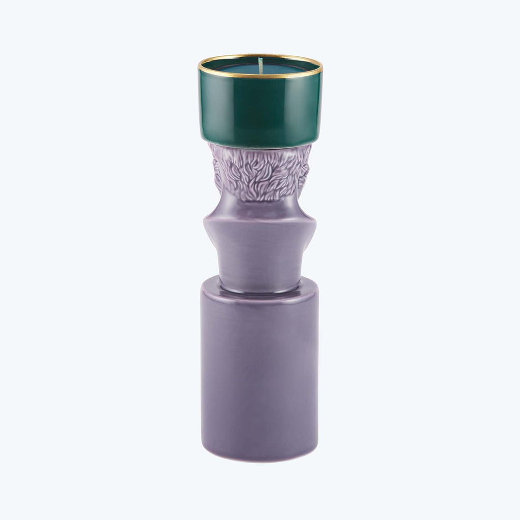 Modern cylindrical candleholder with textured pattern and vibrant color contrast.