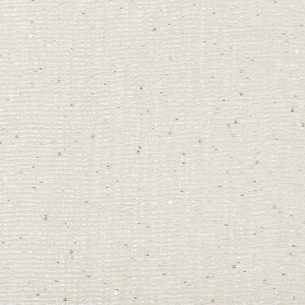 Close-up of light-colored textured fabric with horizontal fibers and imperfections.