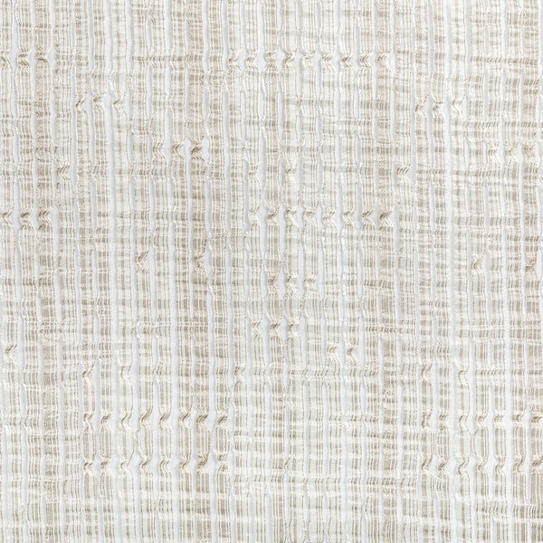 Close-up view of a beige fabric with intricate woven pattern.