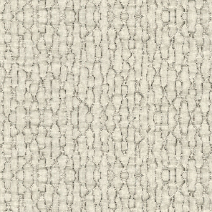 Close-up of a knitted or woven fabric with geometric pattern