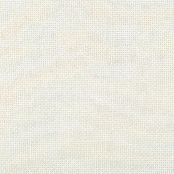 Close-up of a neutral-colored fabric with a tight, uniform weave.