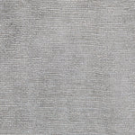 Close-up shot of a silvery-gray textured fabric with tight weave.
