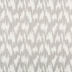 Abstract, geometric pattern of gray dashes on a light background.