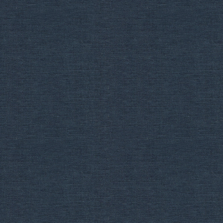 Close-up of dark blue denim fabric with twill weave pattern.