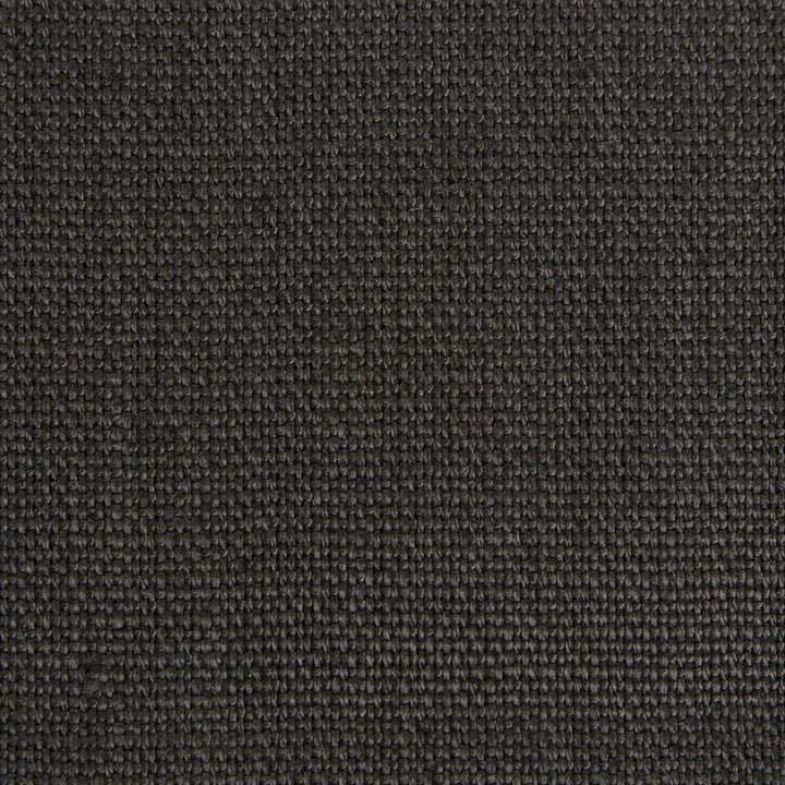 Close-up of dark, textured fabric with uniform woven pattern.