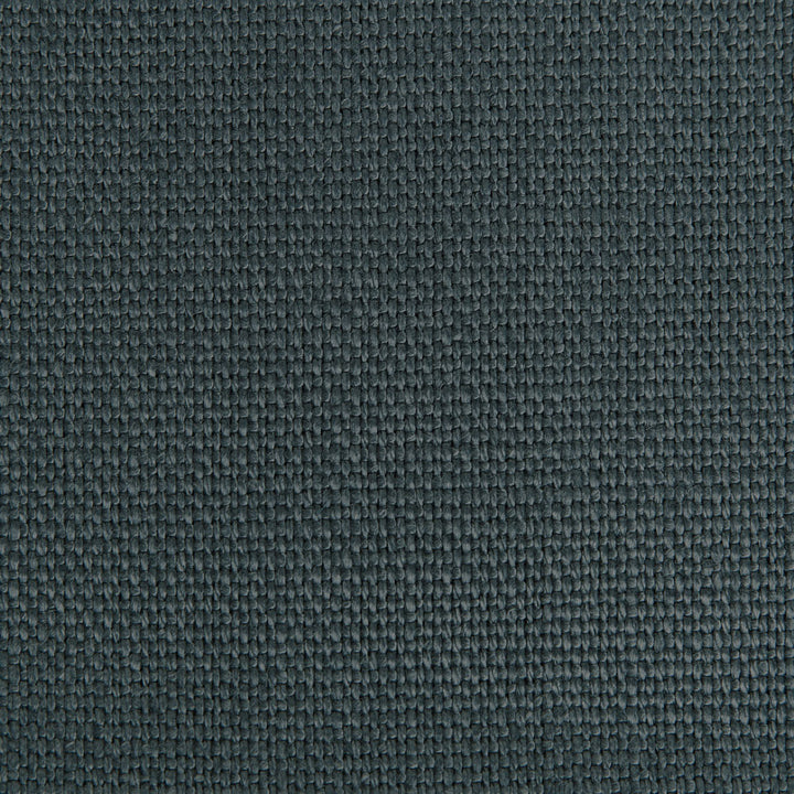 Close-up view of a dark, slate gray textured fabric with small-scale pattern.