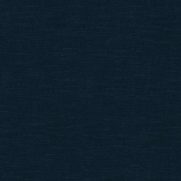 Close-up shot of a deep navy blue textured fabric background.