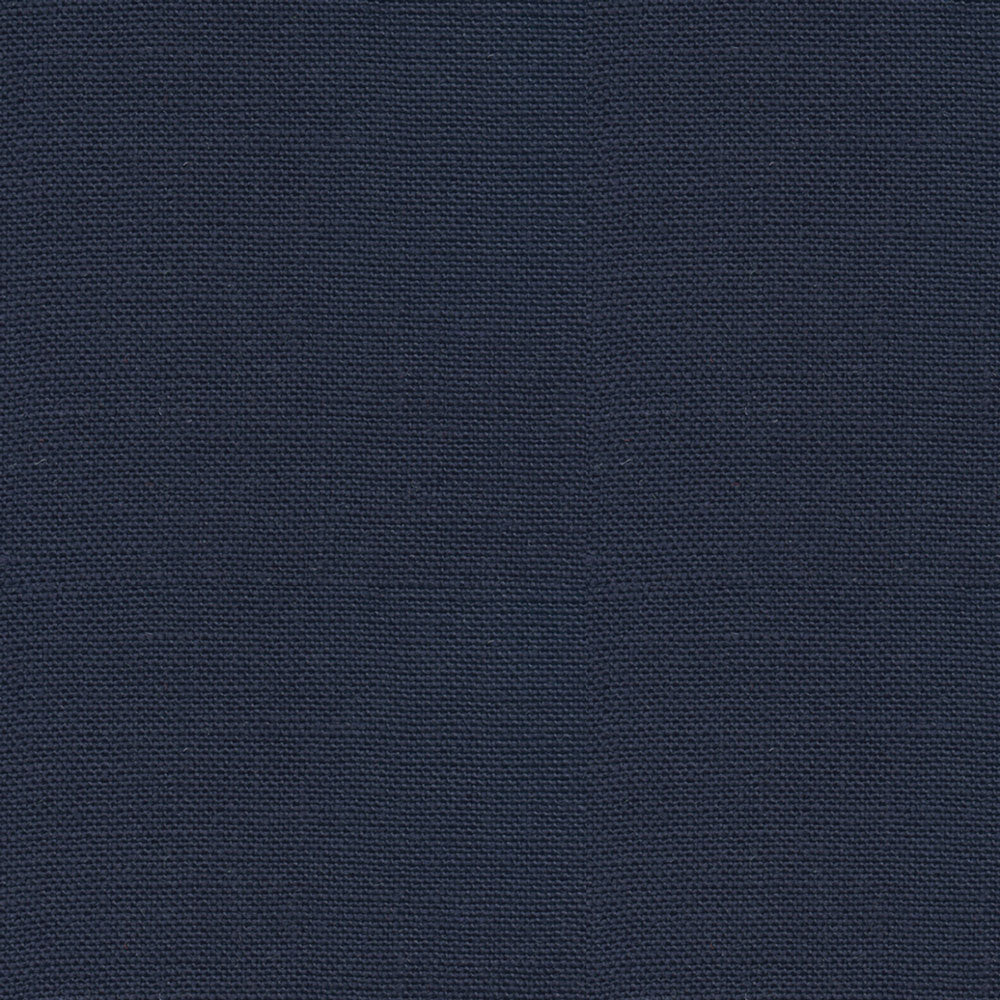 Close-up of dark blue twill weave fabric, displaying diagonal ribbing.