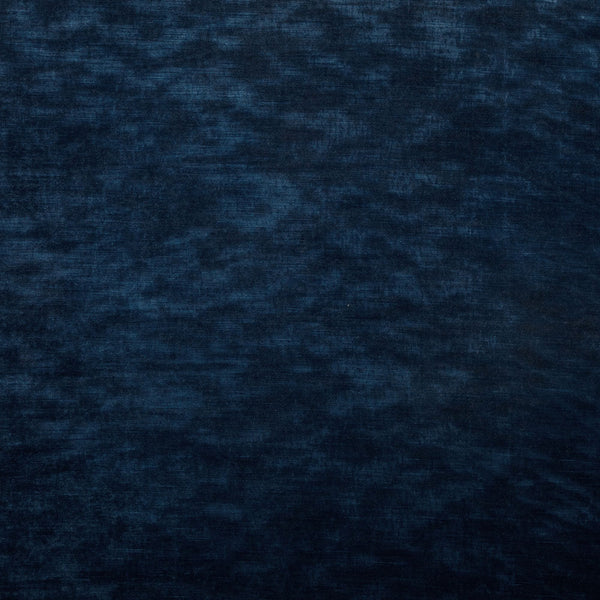 Close-up of deep blue fabric with visible weave pattern.