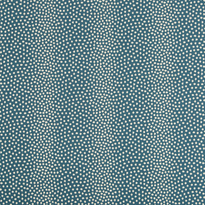 Close-up of teal fabric with white polka dots; textured woven material.