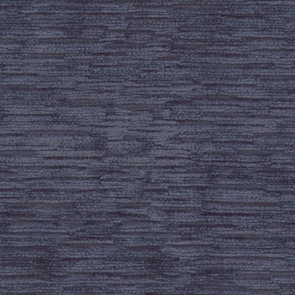 Close-up of a textured blue fabric, evoking depth and texture.