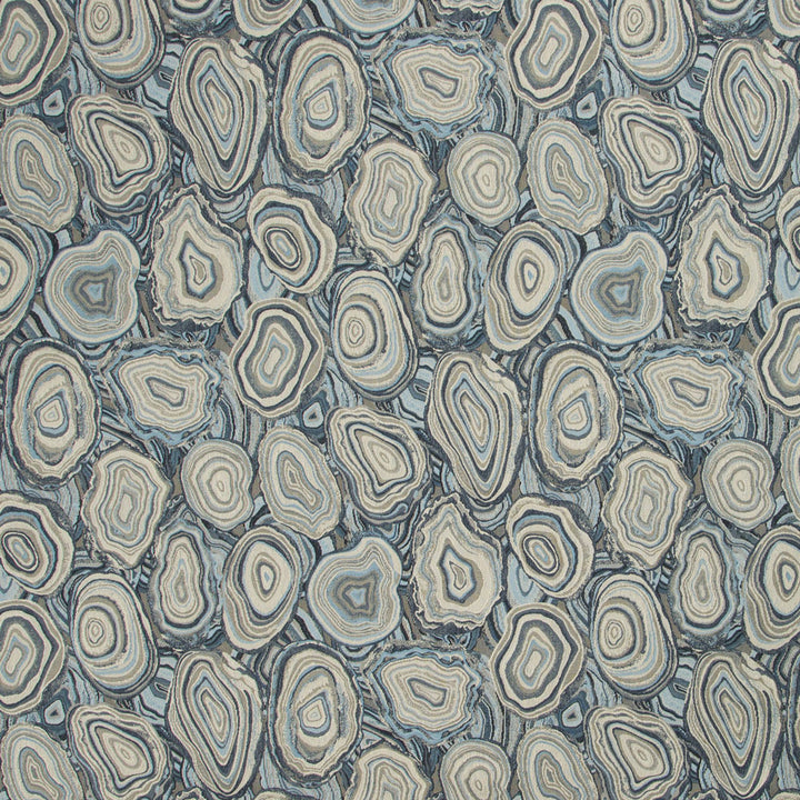 Fabric or wallpaper with a naturalistic agate slice print design.