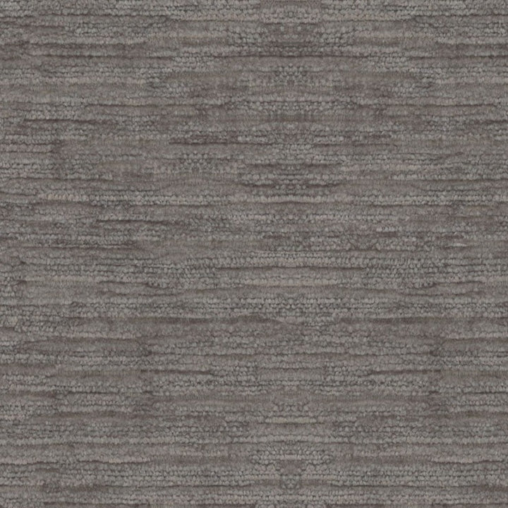 Close-up view of a textured surface with horizontal striation pattern.