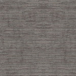 Close-up view of a textured surface with horizontal striation pattern.