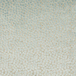 Textured fabric in pale blue with intricate geometric pattern