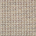 Close-up of a woven fabric with a textured, multi-dimensional pattern.