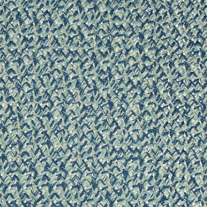 Textured blue and white fabric with intricate basketweave design.