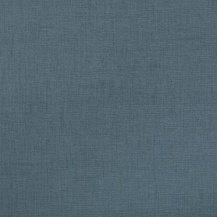 Close-up of blue, textured fabric with tight weave.