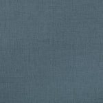 Close-up of blue, textured fabric with tight weave.